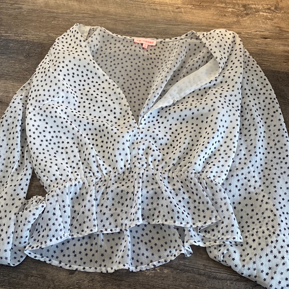 White blouse with blue stars